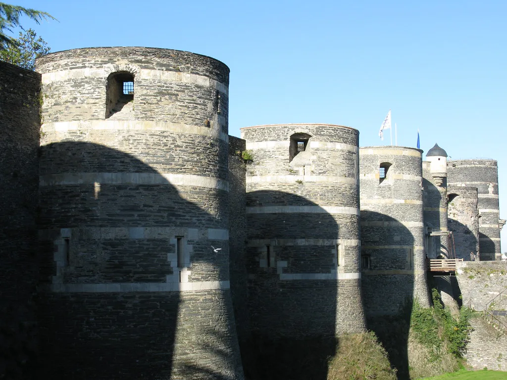 Venue view: the east wall of the Château d'Angers, the fortress described in the article. Resized and converted to WebP.