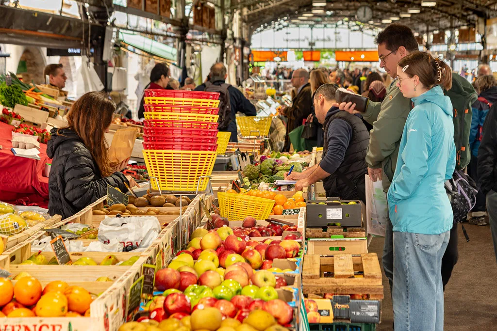 Marché provençal at Cours Masséna in Antibes, showing fresh produce at the market stalls Resized and converted to WebP.