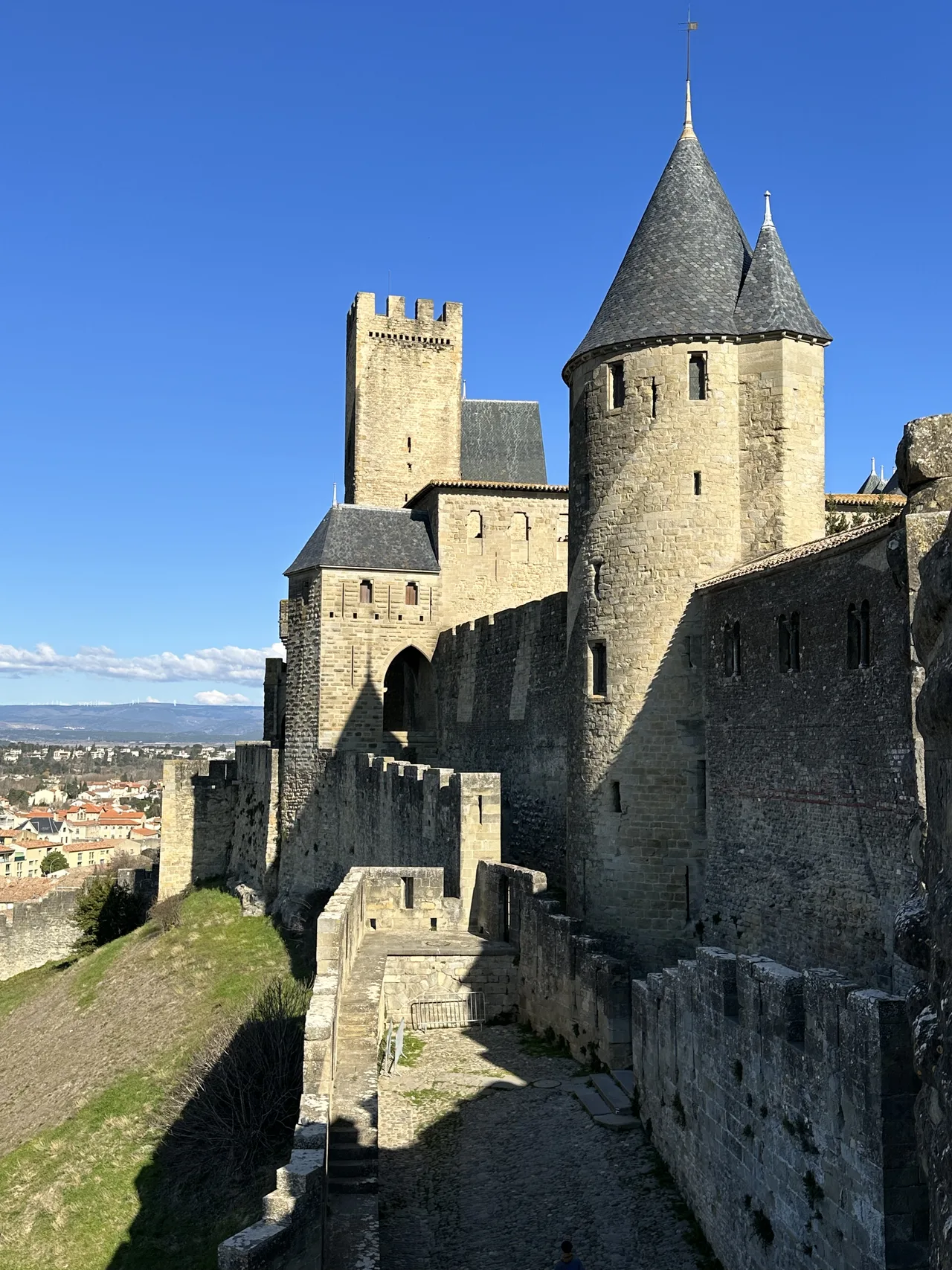 Cité de Carcassonne citadel under the blue sky, Carcassonne, Occitania, France, February